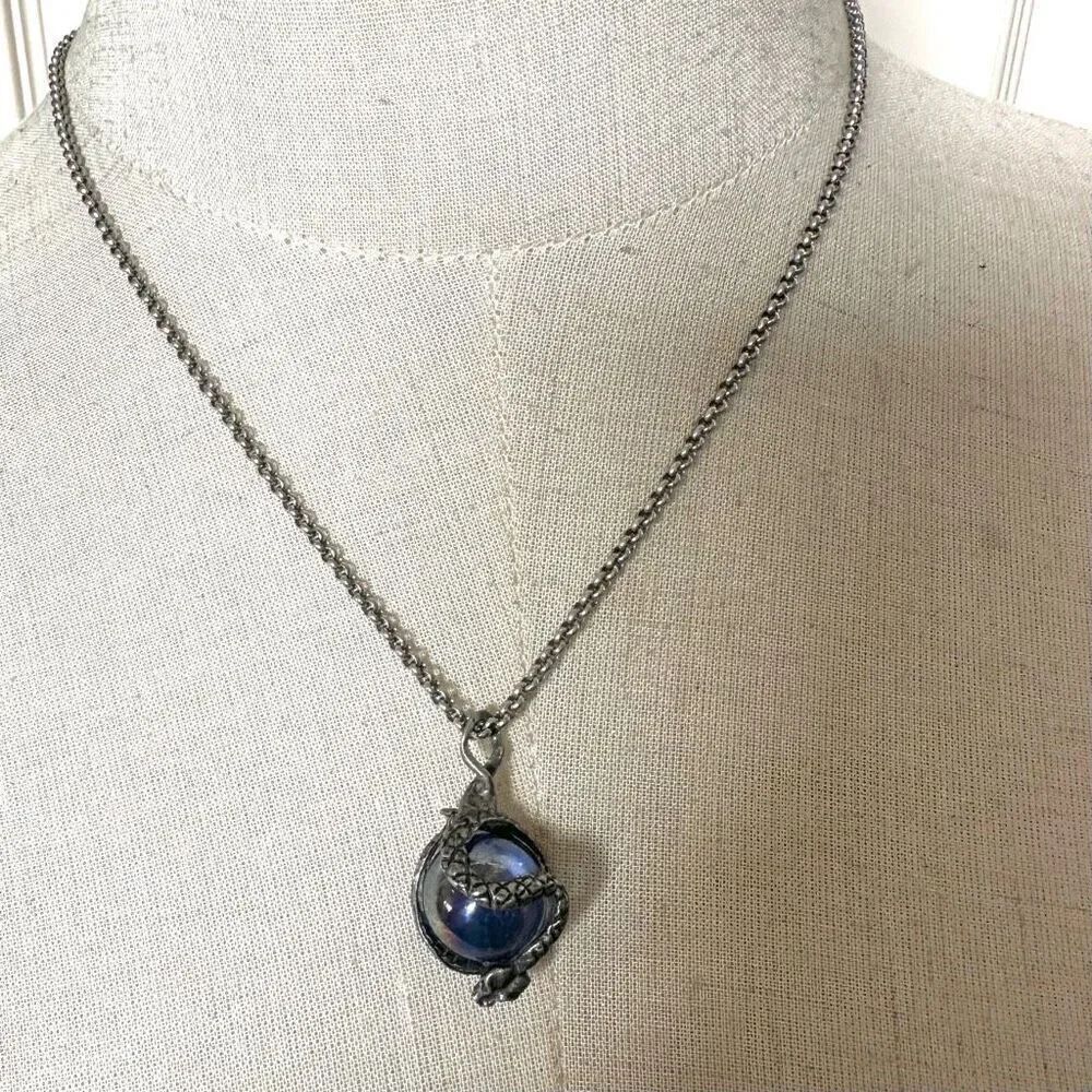 Blue glass snake wrapped pendant necklace